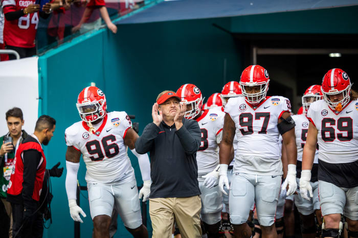 Kirby Smart leads his No. 6 Georgia Bulldogs out of the tunnel to go dominate in the 2023 Orange Bowl. (Brooks Austin / Dawgs Daily).